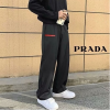 PRADA BIG 고무패치 와이드 핏 뒷밴딩 슬렉스 바지